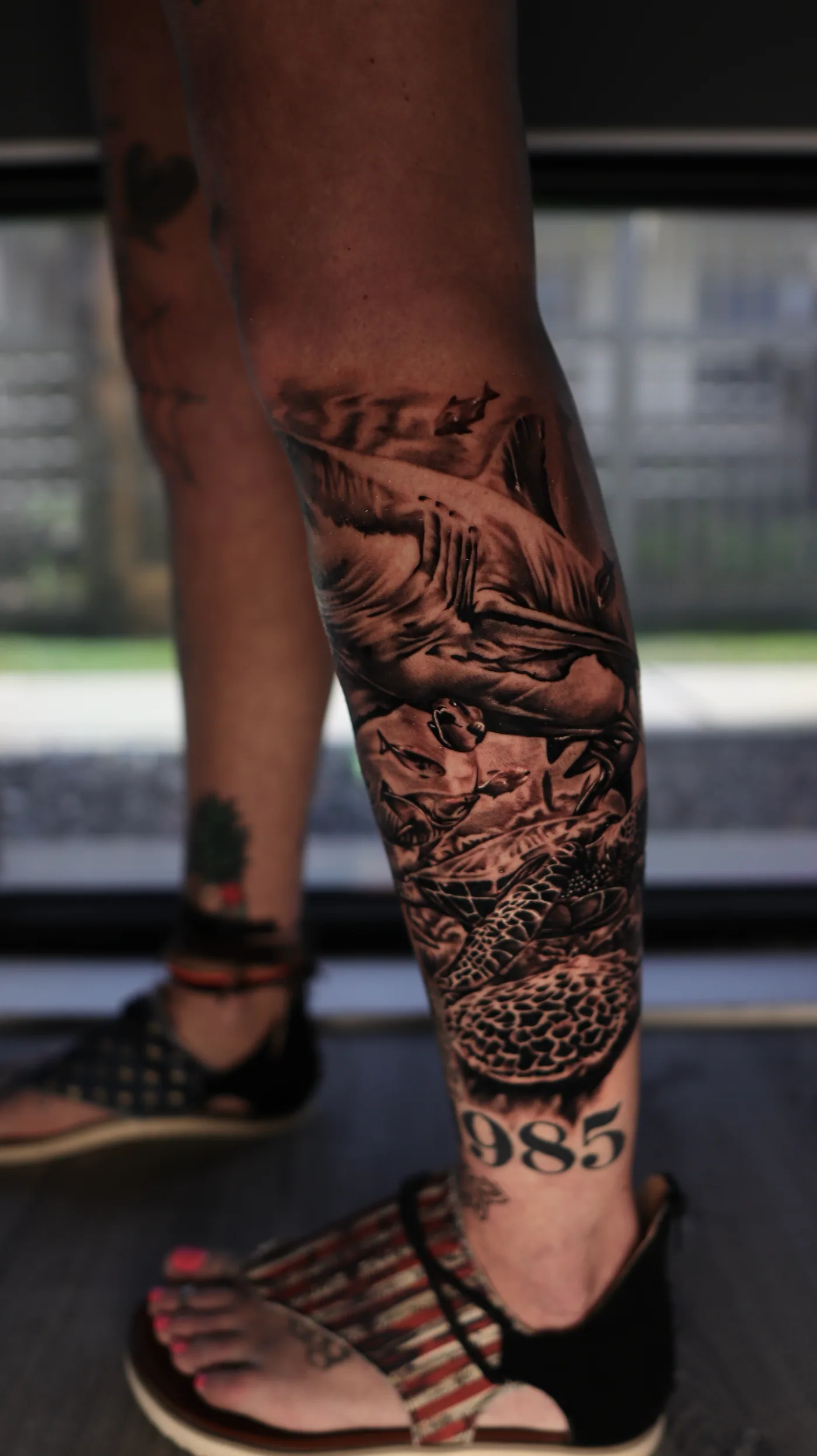 Leg composition, detail view tattoo by Eddie Gonzalez