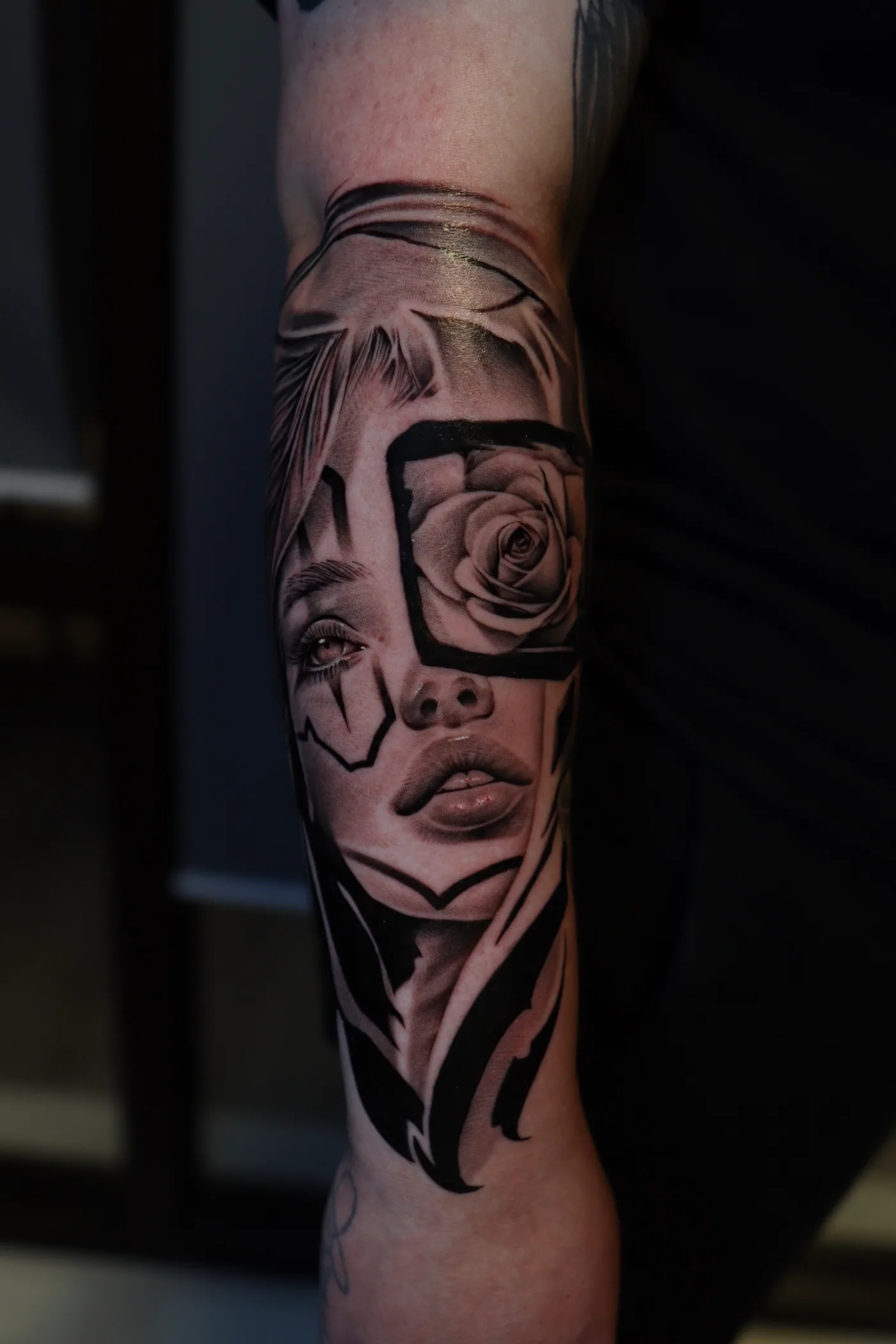Portrait forearm tattoo by Eddie Gonzalez
