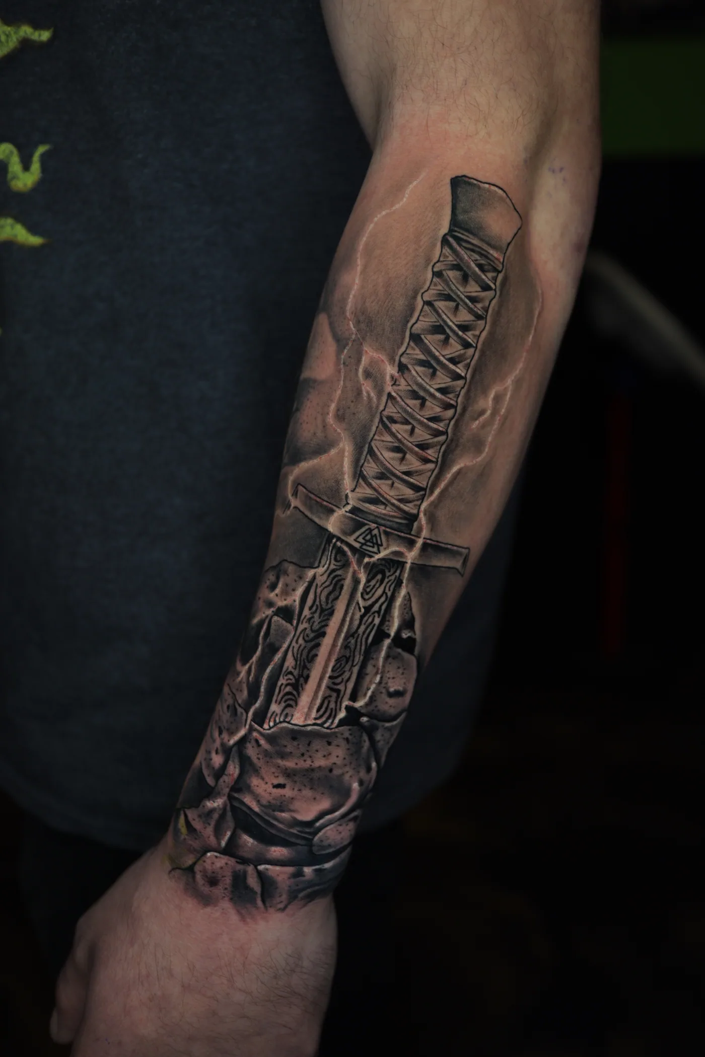Black and grey arm detail tattoo by Eddie Gonzalez
