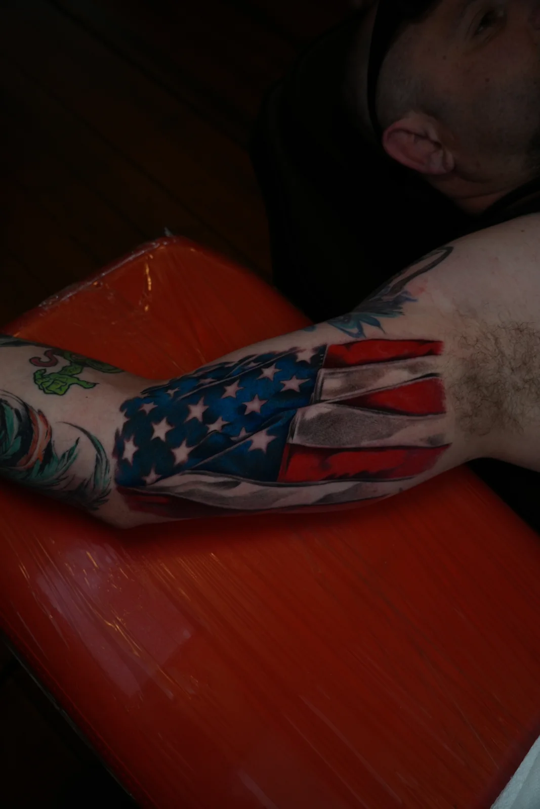 Flag composition tattoo by Eddie Gonzalez